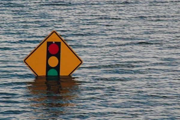 flood-over-warning-signs
