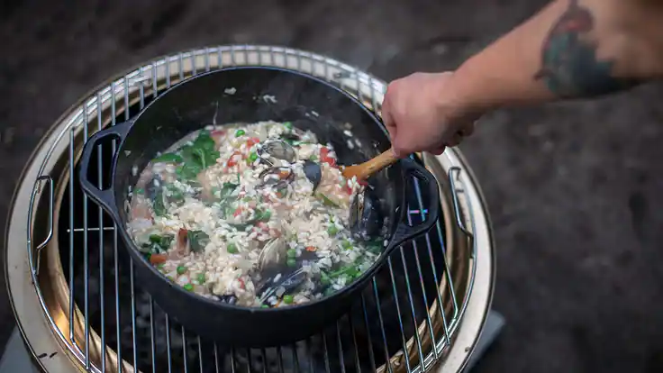 Camp Recipe: Make Seafood Risotto On a Campfire